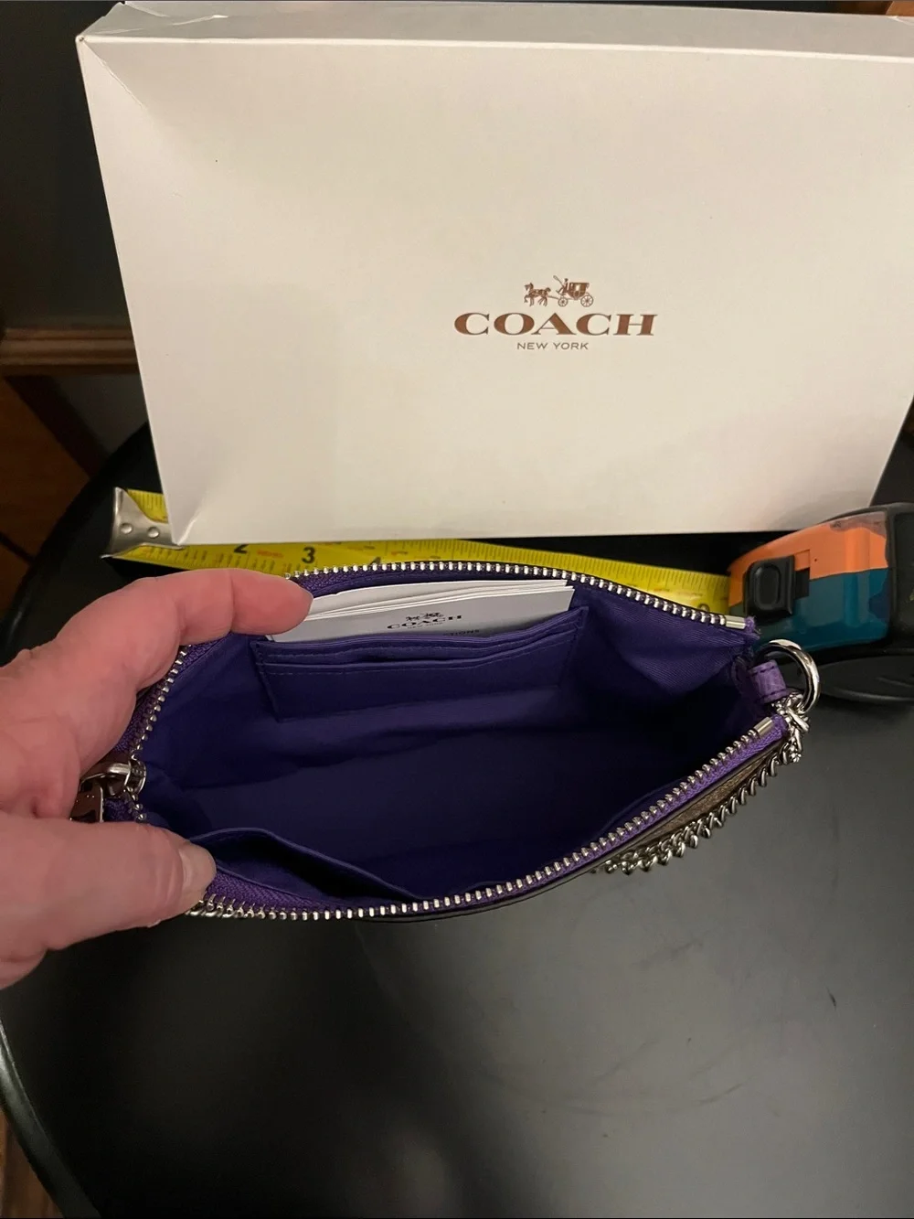 Coach Brown Signature Canvas Wristlet with Purple Trim